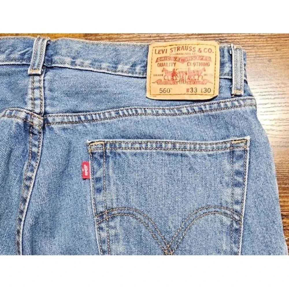 VTG Y2K 560 Loose Comfort Fit Tapered Leg Jeans Men's‎ 33x30 Light Wash